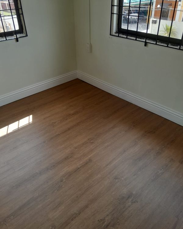 Emberwood SPC flooring installed in Trinidad
