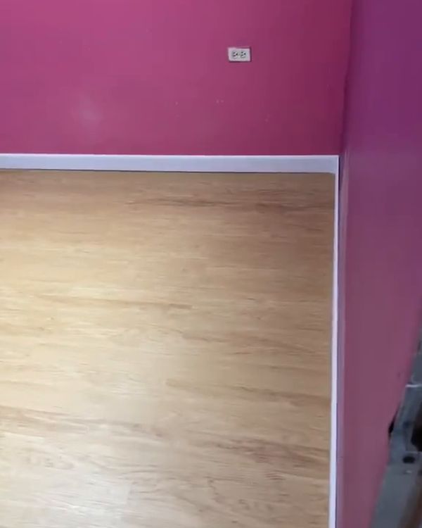 Honey SPC flooring installed in Trinidad